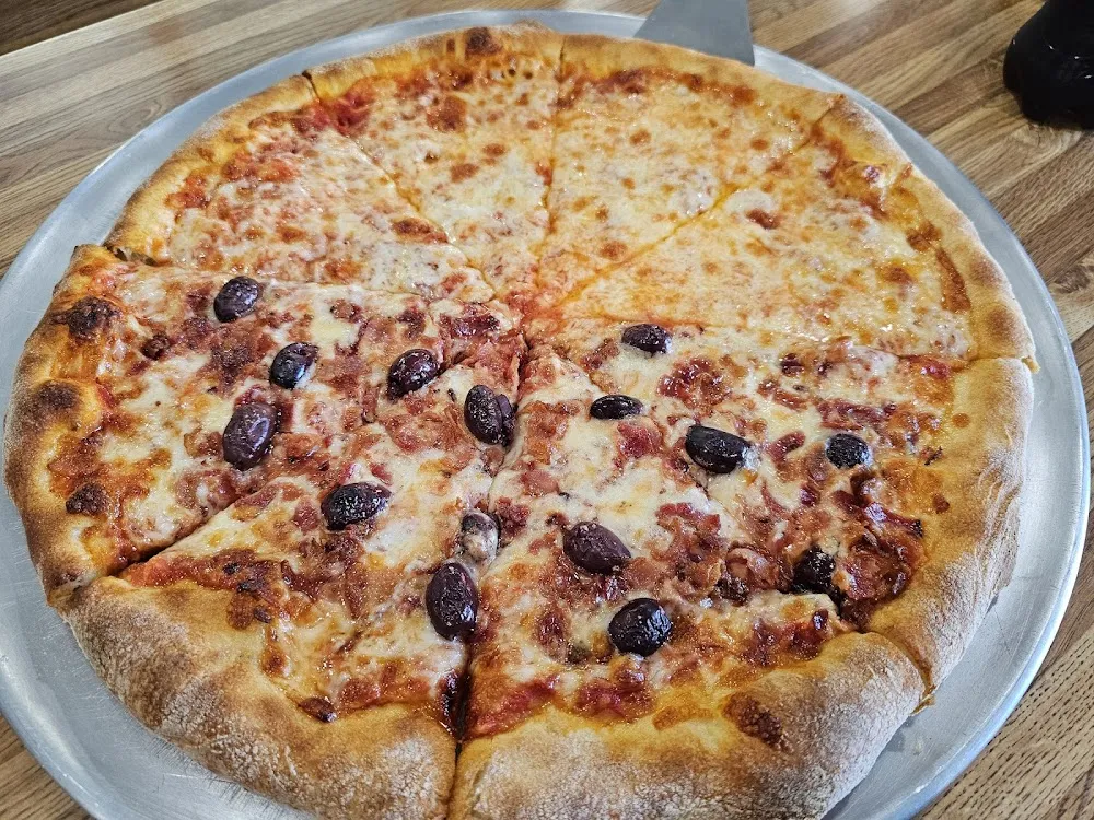 Half Plain Half Black Olives and Bacon Pizza